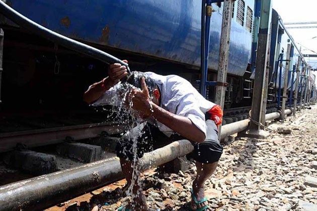 Heat wave man washing head